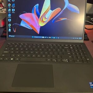 Dell Black Laptop with Vibrant Display